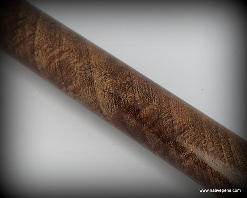 close up of walnut pen blank showing grain figure