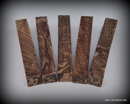 Alburnum Walnut stabilized pen blanks shown in a fan of five